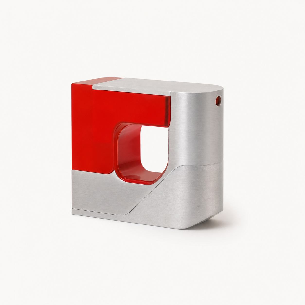 Asymmetric product object in silver metal and translucent red material